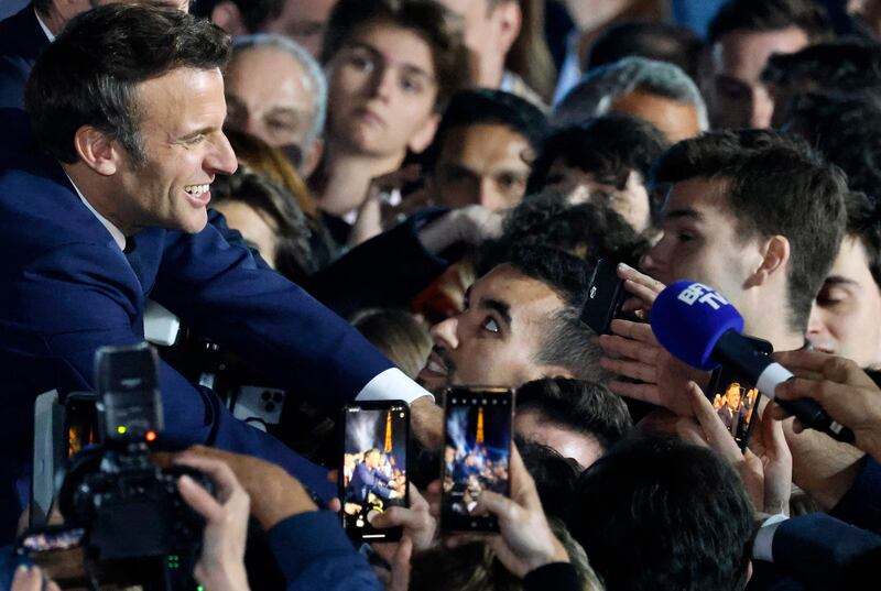Mr Macron also praised those who gave him five more years at the helm of France. AFP