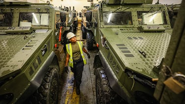 British Army vehicles being loaded on to a ship in preparation for Nato's Steadfast Defender, the biggest war games since the Cold War. AFP