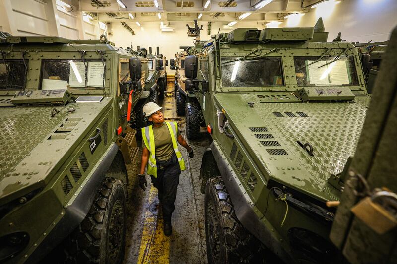 British Army vehicles being loaded on to a ship in preparation for Nato's Steadfast Defender, the biggest war games since the Cold War. AFP