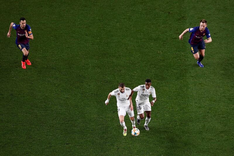 Real Madrid's Karim Benzema, centre left, and and Vinicius Junior in action. EPA