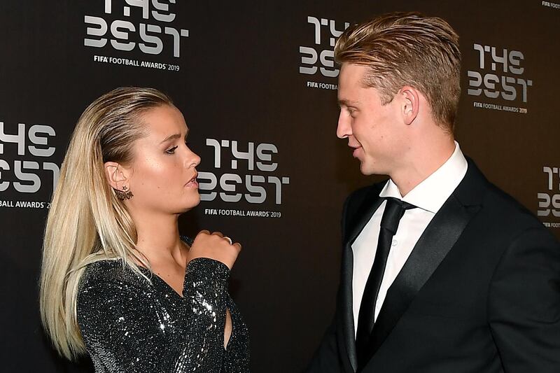 Barcelona's Dutch midfielder Frenkie De Jong and his girlfriend Mikky Kiemeney arrive. AFP