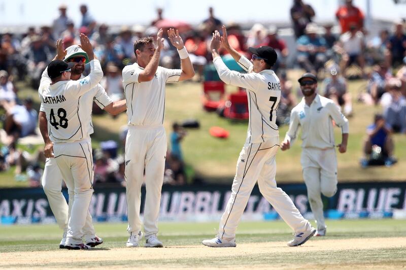 Tim Southee, centre, of New Zealand celebrates the wicket of Ben Stokes. Getty