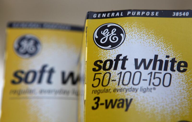 (FILES) In this file photo packages of General Electric light bulbs are displayed on a hardware store shelf July 17, 2009 in San Rafael, California.  General Electric is getting out of the light bulb business, shedding a foundational enterprise from the days of Thomas Edison, the company announced May 27, 2020. The 128-year-old company, in belt-tightening mode following a hit from the coronavirus, will divest GE Lighting to smart home company Savant Systems. 
 / AFP / GETTY IMAGES NORTH AMERICA / JUSTIN SULLIVAN
