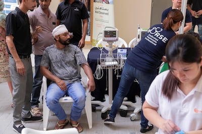 DUBAI, UNITED ARAB EMIRATES. 04 MAY 2018. On the eve of International Labour Day the Medical wing of the Pakistan Association Dubai (PAD) held a Health Awareness Camp at Al Meher Contracting Labour in Jebel Ali. This activity is part of a social responsibility and welfare campaign which creates health awareness and is focused on motivating blue collar workers to adopt healthy habits. A laborer has his blood pressure tested. (Photo: Antonie Robertson/The National) Journalist: Nawal Al Ramahi. Section: National.