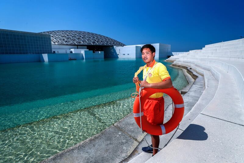 Abu Dhabi, UAE, March 5, 2018.  
Profile of the Louvre Lifeguards - they're on duty at the Louvre to ensure no one finds themselves in trouble in and around the water at the gallery.  Eddie Molion has been living and working as a lifeguard at the UAE for the past four years and is from  the province of Bicol, Philippines.
Victor Besa / The National
Weekend
Reporter:  Melissa Gronlund