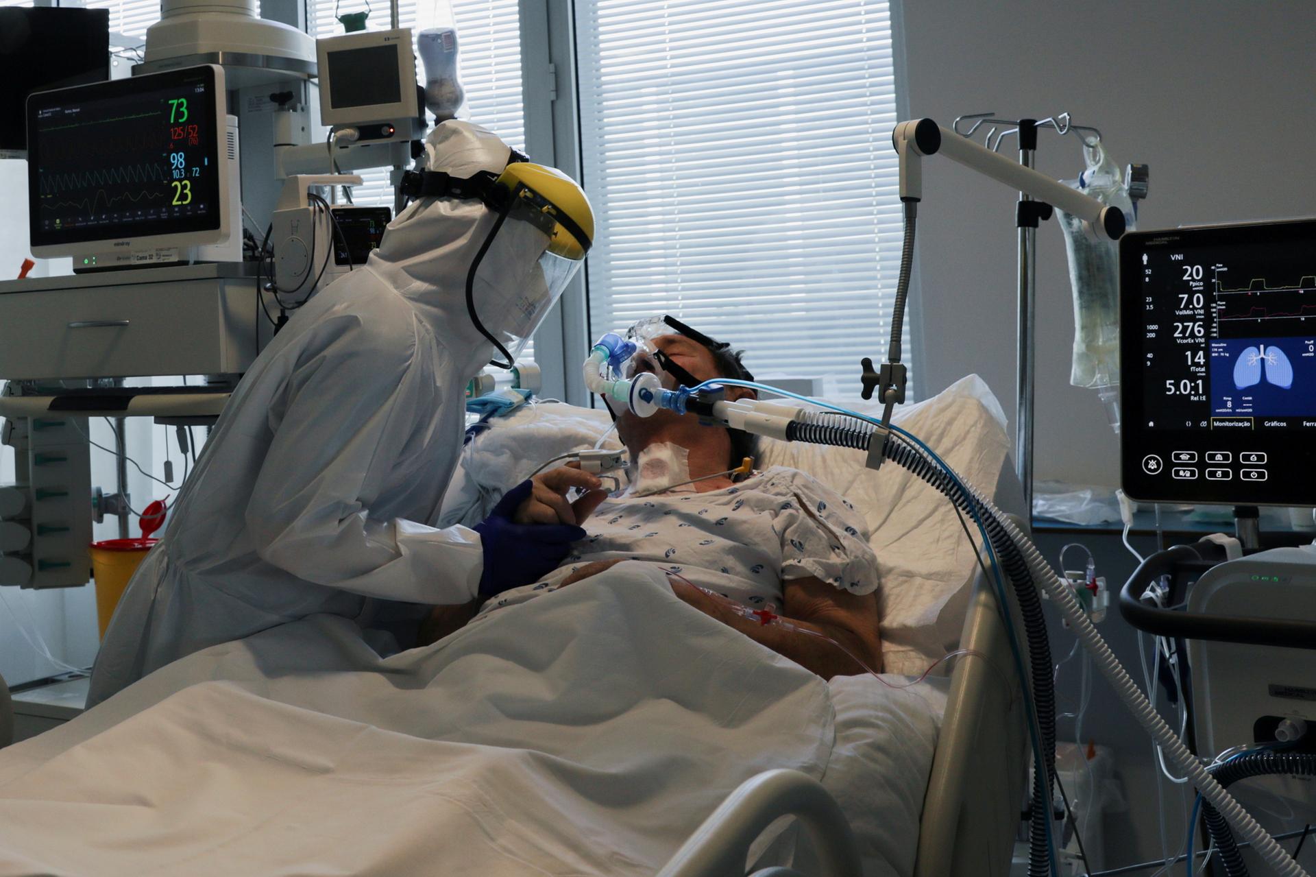 Health staff attends to a patient at the coronavirus disease dedicated ICU unit of the Tras-Os-Montes E Alto Douro Hospital in Vila Real, Portugal. Reuters