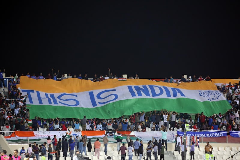 Fans of India attend the match. EPA