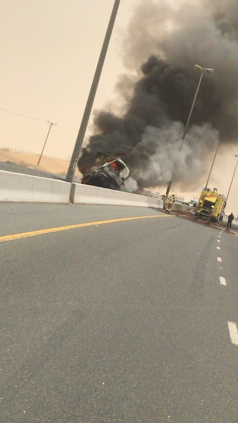 Police are urging drivers to take extra care after a lorry burst into flames after a collision with another vehicle in Sharjah, on July 31, 2018. Courtesy Sharjah Police.