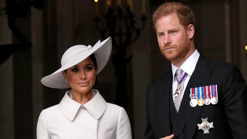 Prince Harry and his wife Meghan leave after a service of thanksgiving for the reign of Queen Elizabeth II at St Paul's Cathedral in June. Getty Images