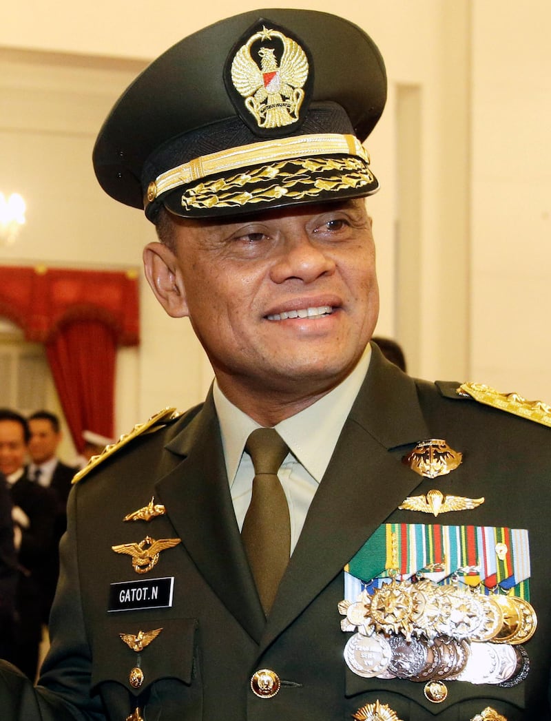 FILE - In this Wednesday, July 8, 2015 file photo, Indonesian Armed Forces Chief Gen. Gatot Nurmantyo pose for a photo after his swearing-in ceremony at the presidential palace in Jakarta, Indonesia. Indonesia's government is seeking clarification from the U.S. after Nurmantyo was denied entry to the country. (AP Photo/Achmad Ibrahim, File)