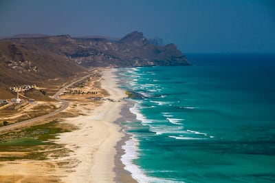 Aerial view of a white sand beach overlooking the Indian Ocean and mountains. Salalah, Oman. (Getty Images) *** Local Caption ***  ut23se-top10-oman02.jpg