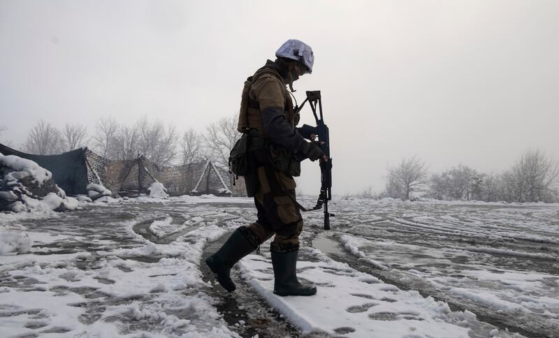 A Ukrainian soldier at the line of separation from pro-Russian rebels in Ukraine's Donetsk region. AP