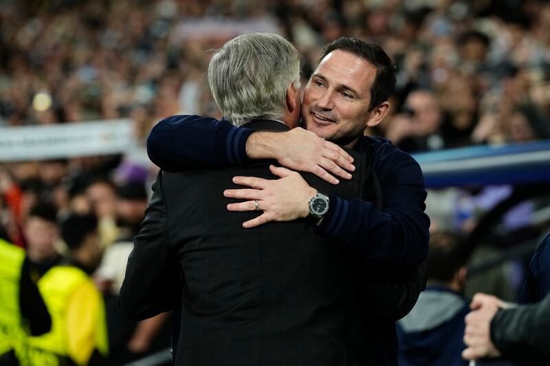Chelsea's caretaker manager Frank Lampard greets Real Madrid's head coach Carlo Ancelotti. AP 