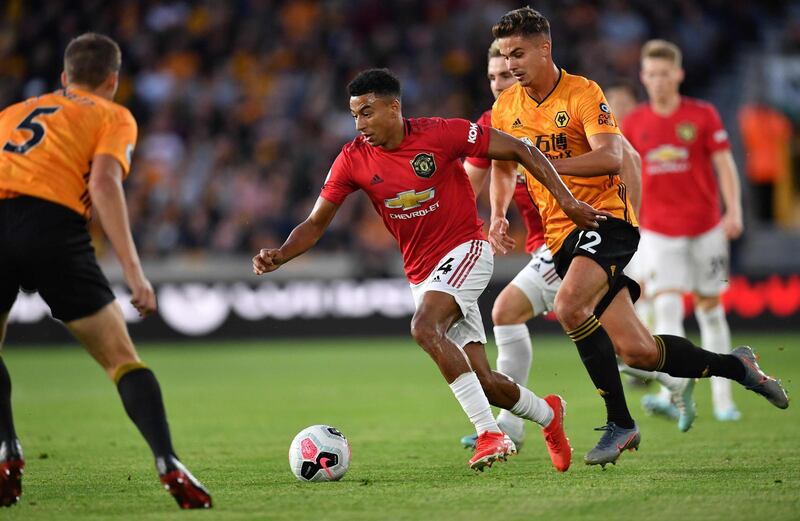 Wolverhampton Wanderers defender Ryan Bennett vies with Manchester United's Jesse Lingard. AFP