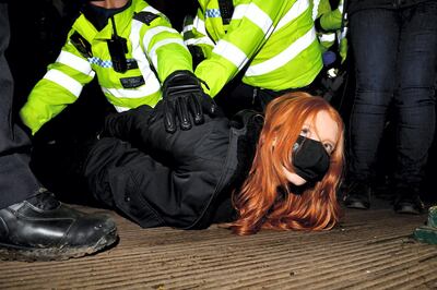 Mandatory Credit: Photo by James Veysey/Shutterstock (11798757x)
A woman is arrested at a vigil in memory of murdered Sarah Everard. Patsy Stevenson
Sarah Everard vigil, Clapham, London, UK - 13 Mar 2021