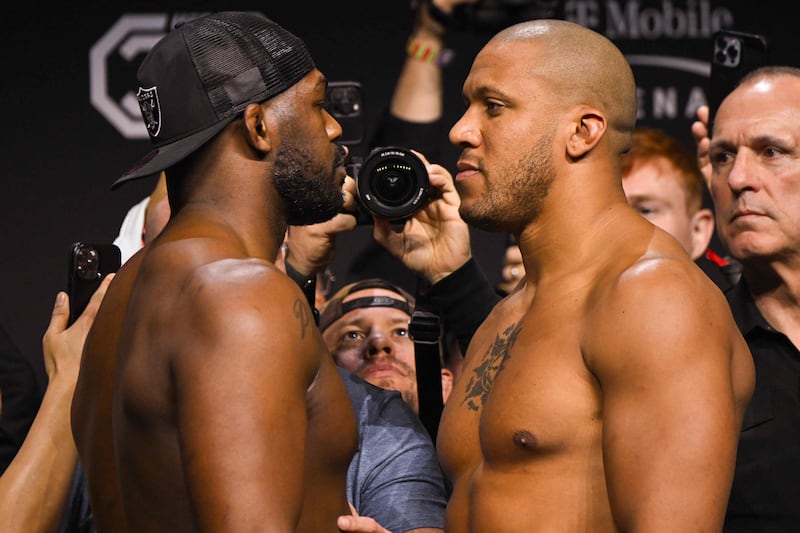 Jon Jones, left, and Ciryl Gane face off during the ceremonial weigh-in ahead of their UFC 285 heavyweight title bout at the MGM Garden Arena, in Las Vegas, Nevada on March 3, 2023. AFP