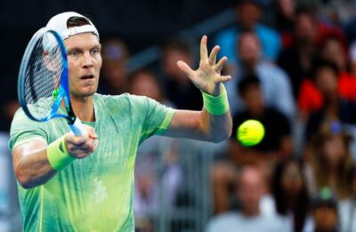 epa06456322 Tomas Berdych of the Czech Republic in action during his third round match against Juan Martin del Potro of Argentina at the Australian Open Grand Slam tennis tournament in Melbourne, Australia, 20 January 2018.  EPA/NARENDRA SHRESTHA