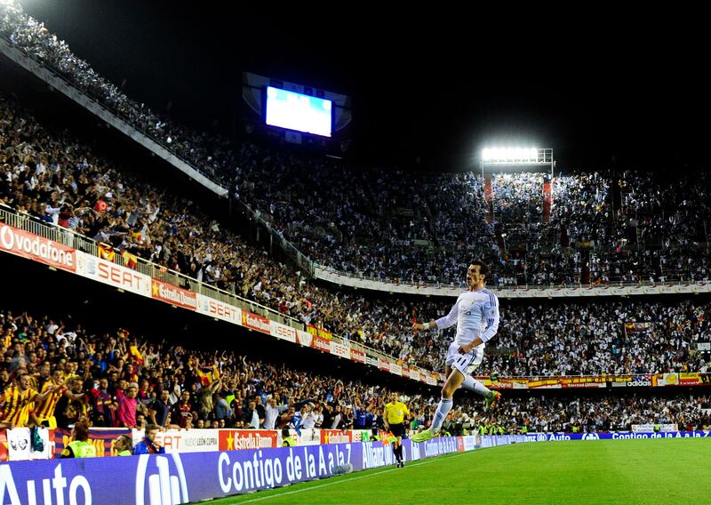 Real Madrid's Gareth Bale celebrates after scoring during the Spanish Copa del Rey final against Barcelona at the Mestalla Stadium in Valencia in April 2014. AFP