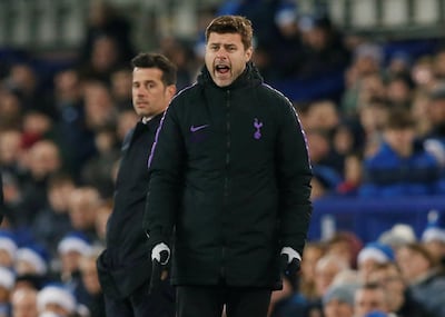 Soccer Football - Premier League - Everton v Tottenham Hotspur - Goodison Park, Liverpool, Britain - December 23, 2018  Tottenham manager Mauricio Pochettino as Everton manager Marco Silva looks on  REUTERS/Andrew Yates  EDITORIAL USE ONLY. No use with unauthorized audio, video, data, fixture lists, club/league logos or "live" services. Online in-match use limited to 75 images, no video emulation. No use in betting, games or single club/league/player publications.  Please contact your account representative for further details.