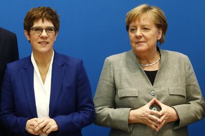BERLIN, GERMANY - FEBRUARY 10:  Federal Minister of Defence and CDU leader, Annegret Kramp-Karrenbauer and German Chancellor Angela Merkel (CDU) arrive for a meeting of the CDU leadership at CDU headquarters shortly after the leader of the German Christian Democrats (CDU) announced she intends to step down as party leader and chancellor candidate on February 10, 2020 in Berlin, Germany. Kramp-Karrenbauer's viability as party leader came into question after she was unable to steer the CDU in the state of Thuringia towards the federal party's directive following the recent election debacle there.  (Photo by Michele Tantussi/Getty Images)