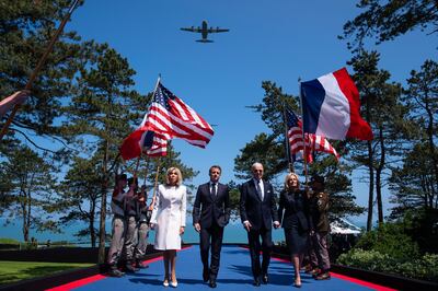 The French and US presidents with their wives Brigitte Macron, left, and Jill Biden. AP