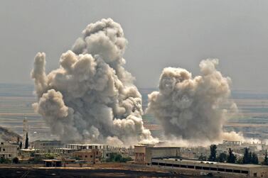 Plumes of smoke rise following reported Syrian government forces' bombardment of the town of Khan Sheikhun in the southern countryside of Idlib province. AFP