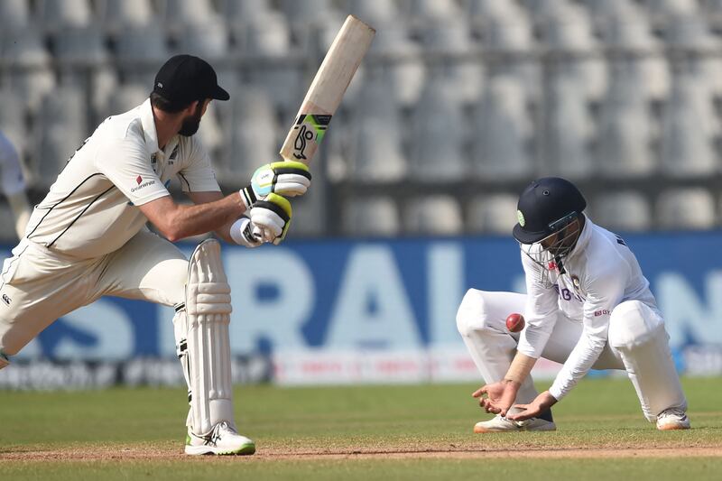 India's Mayank Agarwal catches the ball to dismiss New Zealand's Will Somerville. AFP