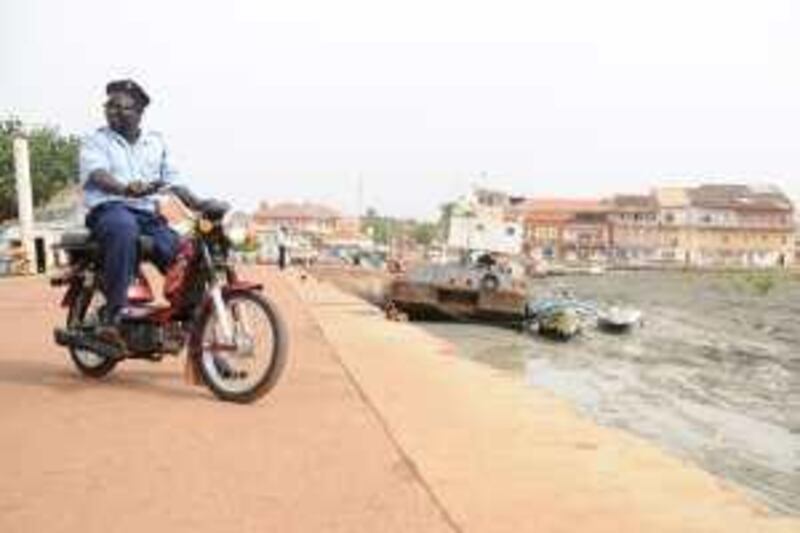 Bissau/June 27 - Malam Dabo works for the Maritime Police in Bissau. Guinea-Bissau has no Navy to patrol its waters, so the Maritime Police survey the port border, though they suffer from a lack of resources.  
 *** Local Caption ***  GBdrugs7.jpg