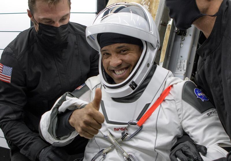 Nasa astronaut Victor Glover gives the thumbs up as he helped out of the SpaceX Crew Dragon capsule, after splashing down in the Gulf of Mexico, off the coast of Panama City, Florida, US. EPA