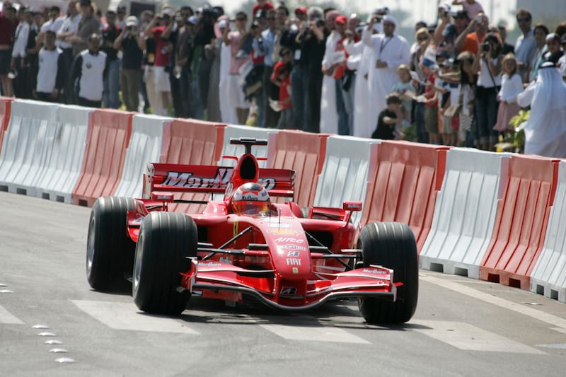 Kimi Raikkonen in his Ferrari during the show on Cornich Road, Abu Dhabi. AFP