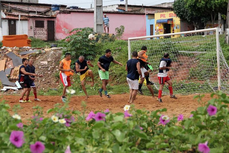 Residents playing a match in the Bom Pastor neighborhood of Natal. Nuno Guimaraes / Reuters