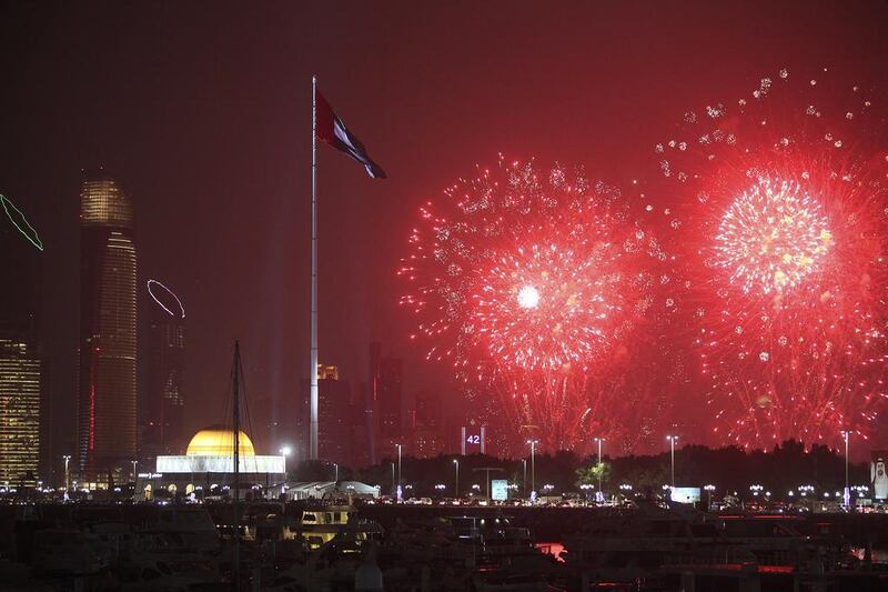 Fireworks lit up the nightsky along the Corniche in Abu Dhabi as the UAE celebrated its 42nd National Day. Lee Hoagland/The National