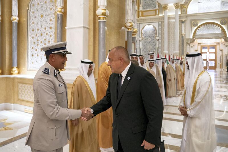 ABU DHABI, UNITED ARAB EMIRATES - October 21, 2018: HE Major General Mohamed Khalfan Al Romaithi, Commander in Chief of Abu Dhabi Police and Abu Dhabi Executive Council Member (L), greets HE Boyko Borissov, Prime Minister of Bulgaria (2hd R), during a reception at the Presidential Palace. Seen with HH Sheikh Mohamed bin Zayed Al Nahyan, Crown Prince of Abu Dhabi and Deputy Supreme Commander of the UAE Armed Forces (R).

( Hamad Al Kaabi / Crown Prince Court - Abu Dhabi )
---