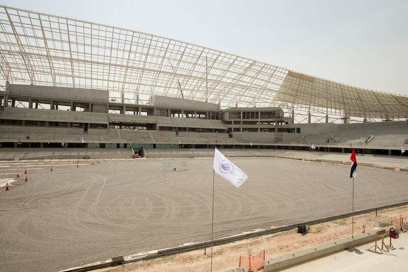AL AIN, EASTERN REGION OF ABU DHABI, UNITED ARAB EMIRATES - May 08, 2013: Al Ain Football Club and UAE flags at the Hazza Bin Zayed Stadium, which will serve as the new home ground of Al Ain Football Club.( Ryan Carter / Crown Prince Court - Abu Dhabi ).---