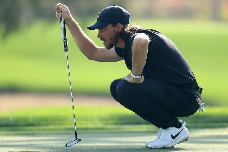 England's Tommy Fleetwood of England lines-up a shot on the fifteenth green on his way to an opening round 68. Getty