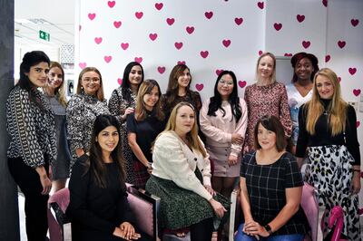 Natasha, owner of TishTash PR office, center, poses for photos with her team of women employees at their office in Dubai, UAE, Sunday, Feb. 2, 2020. TishTash is a Dubai based women-only workplace that specializes in PR and marketing for beauty, health & wellness. Shruti Jain The National