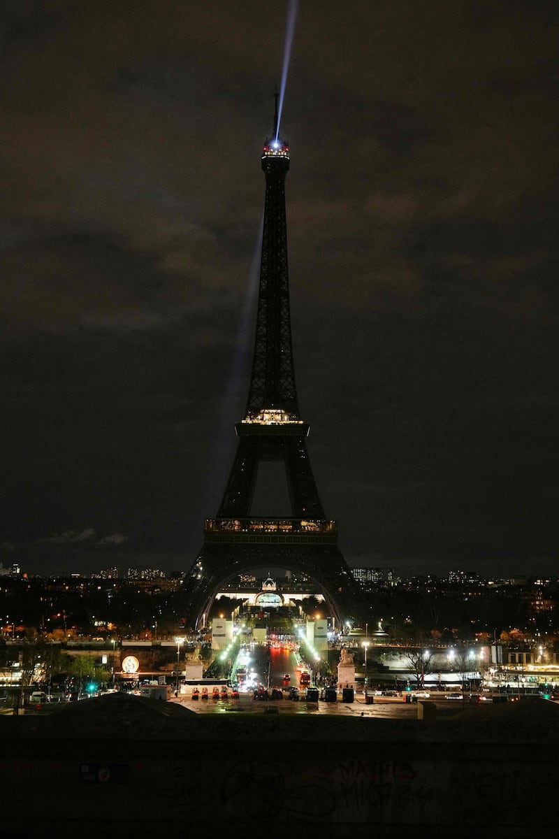 Paris' Eiffel Tower with the lights off during the Earth Hour environmental campaign. AFP