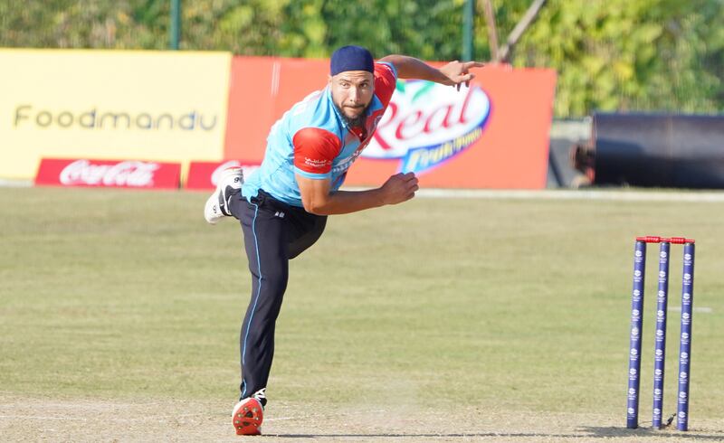 Sayed Monib bowling for Kuwait against the UAE at the T20 World Cup Asia Qualifier in Kathmandu, Nepal. Subas Humagain for The National