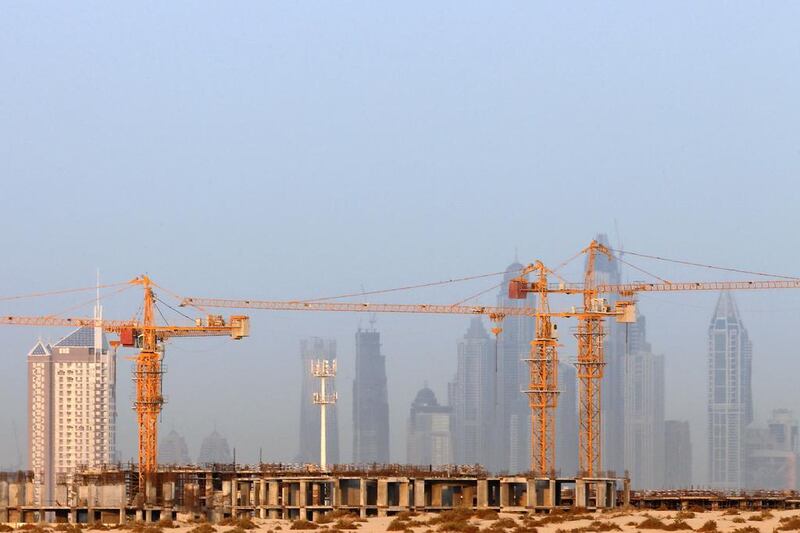 Phidar Advisory has suggested that Dubai property prices could drop by a further 20 per cent through this year and the next as rents soften. Karim Sahib / AFP