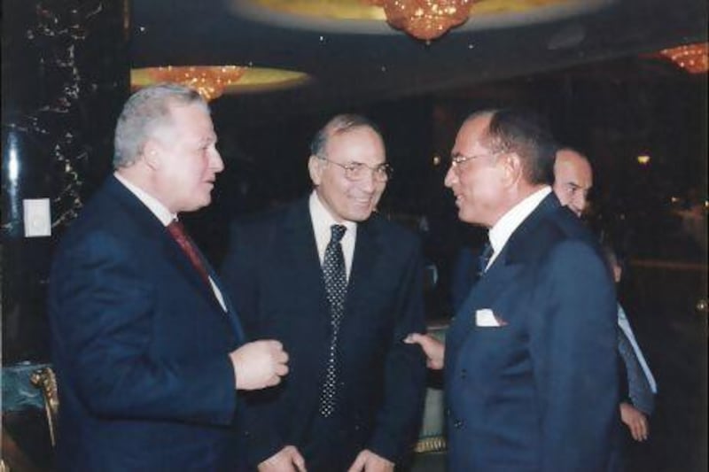 An undated photo of Hussein Salem, right, meeting with Hosni Mubarak's personal secretary, Gamal Abdel Aziz, left, and Ahmed Shafiq, centre, former minister of civil aviation and Mubarak's last prime minister.