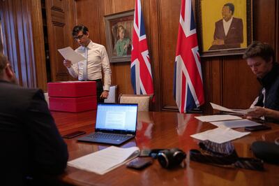 Rishi Sunak works on his Spending Review speech with members of his team in his offices in 11 Downing Street. Courtesy HM Treasury 