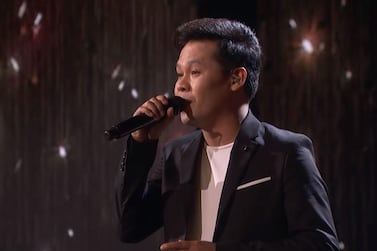 Marcelito Pomoy performing on America's Got Talent: The Champions.