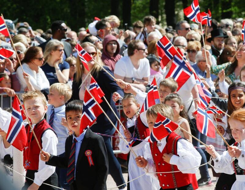 Children during a parade on the National Day in Oslo, Norway on May 17, 2016. Norway was declared the top country in the World Happiness Report 2017 released on March 20, 2017. NTB Scanpix/Terje Pedersen/via Reuters