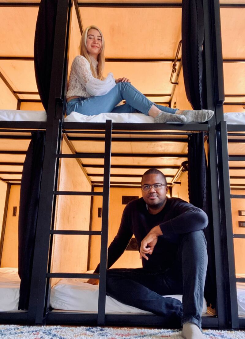 Brownstone co-founders Christina Lennox and James Stallworth pose in two sleeping pods.