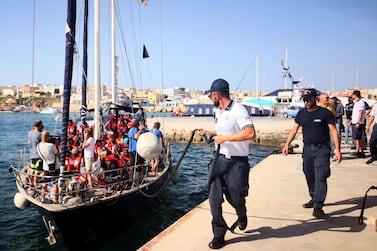 The migrant rescue ship carrying 41 migrants rescued off Libya Thursday docked at the port of Lampedusa on Friday. EPA