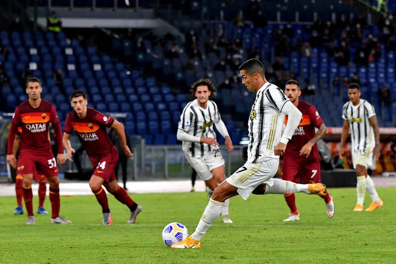 ROME, ITALY - SEPTEMBER 27: Cristiano Ronaldo of Juventus scoring his penalty goal ,during the Serie A match between AS Roma and Juventus at Stadio Olimpico on September 27, 2020 in Rome, Italy. (Photo by MB Media/Getty Images)