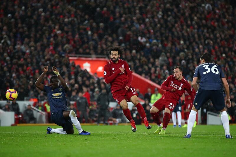 LIVERPOOL, ENGLAND - DECEMBER 16:  Xherdan Shaqiri of Liverpool scores his team's third goal during the Premier League match between Liverpool FC and Manchester United at Anfield on December 16, 2018 in Liverpool, United Kingdom.  (Photo by Clive Brunskill/Getty Images)