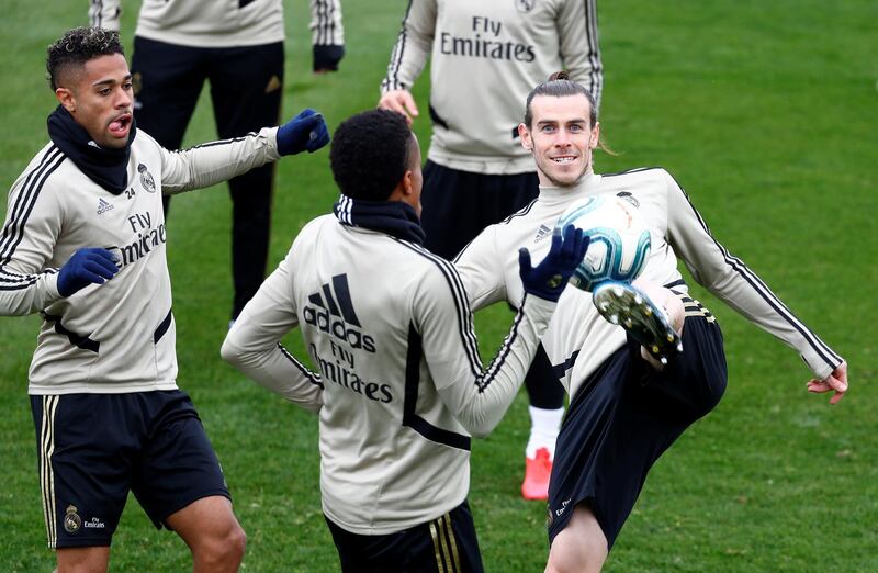 Soccer Football - Real Madrid Training - Ciudad Real Madrid, Madrid, Spain - February 29, 2020   Real Madrid's Gareth Bale and Mariano Diaz during training   REUTERS/Juan Medina
