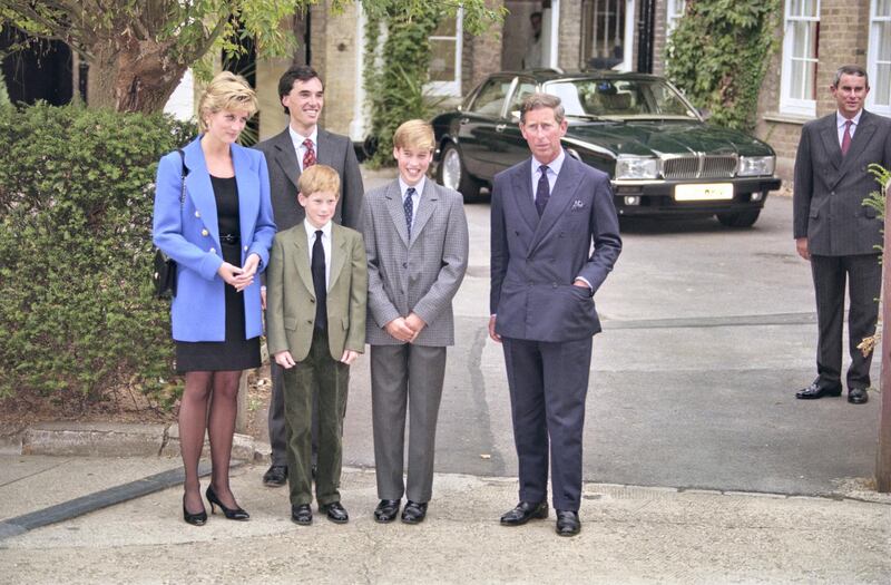 British Royal Diana, Princess of Wales (1961-1997), wearing a blue jacket over a black dress, with Eton housemaster Dr Andrew Gailey, Prince Harry, Prince William, and Prince Charles outside Manor House on Prince William's first day at Eton College in Eton, Berkshire, England, 16th September 1995. (Photo by Princess Diana Archive/Hulton Archive/Getty Images)