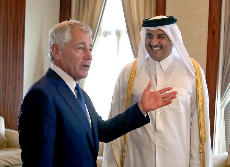 The emir of Qatar, Sheikh Tamim bin Hamad Al Thani, received the US secretary of defence, Chuck Hagel, during his visit to Doha last week. Mark Wilson / AP Photo
